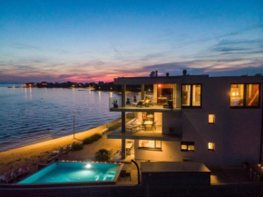 Jimmys Beach direkt am Meer und beheiztem Pool